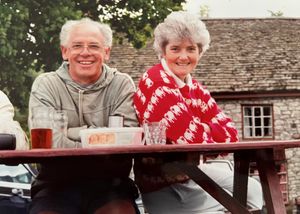 John and Dorothy enjoying a drink after a day's rambling