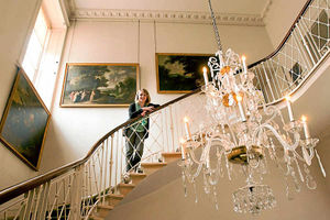 Shining light  Jenny Bell admires the sparkling and elegant chandelier on the staircase of Dudmaston Hall