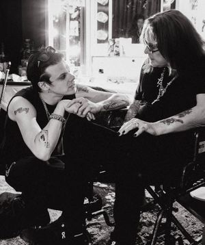 Yungblud pictured with Ozzy Osbourne back stage at Villa Park