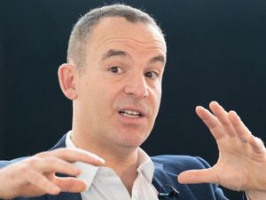 Martin Lewis gestures while speaking