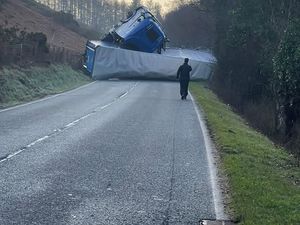 Supporting image for story: Main Powys road is closed in both directions after a heavy goods vehicle overturned