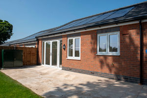 Exterior of one of the bungalows at the 'Magic Gardens' site
