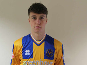Supporting image for story: Jack Hendry on the ball for Shrewsbury Town