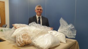 DI Matt Phillips with seized drugs
