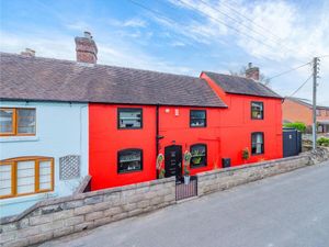 Supporting image for story: Inside the 'truly unique' Telford house painted bright red that's on the market