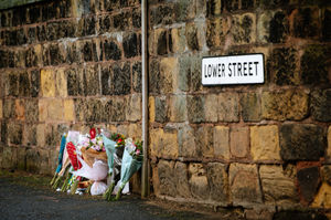 Tributes at the scene of the crash where a 17-year-old girl was seriously injured and later died. Between Lower Street and Sandy Lane in Wolverhampton
