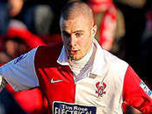 Supporting image for story: Baker signs permanent Harriers deal
