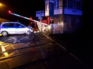 Supporting image for story: Shropshire level crossing closed after car smashes into barriers