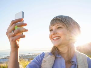 Young woman taking selfie