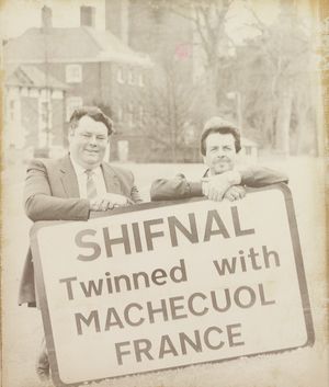 Signs which celebrated Shifnal's twinning with a French town, Machecoul, had to be rapidly altered as the name of the French town had been misspelt. The photograph shows Councillor Gerald Nickless (left) and Leonard Sherriff with one of the signs in April 1989.