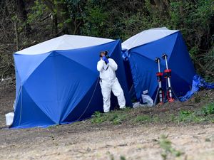 Forensics investigating the scene