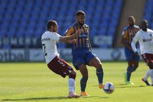Michael Harriman of Northampton Town and Rekeil Pyke of Shrewsbury Town.