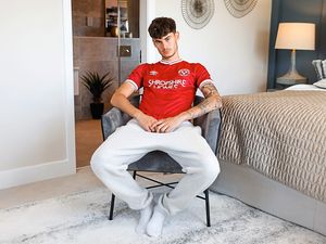 Supporting image for story: Red alert! Shrewsbury Town unveil away strip