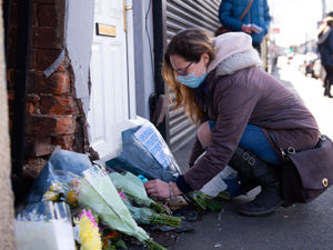 Supporting image for story: Tributes left at scene as two-week-old boy killed in pram crash