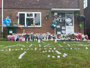 Tributes left outside the house where Jahziah Coke was stabbed to death. Photo: Matthew Cooper/PA Wire.