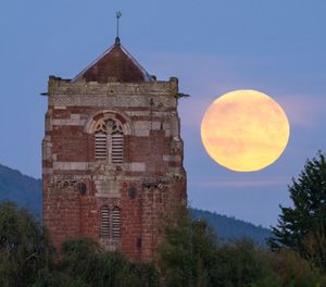 Harvest Moon taken Tuesday evening rising over the church of St Eata at Atcham, near Shrewsbury, in Shropshire (picture SWNS/Shropshire and Beyond)