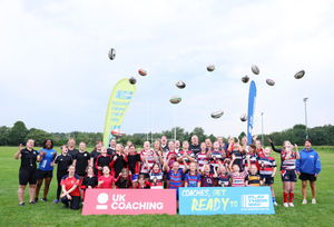 Maggie Alphonsi and the girls took part in a group photo at the end of a child-first coaching session put on by Broughton Park.
