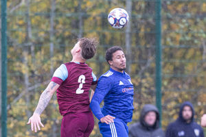 A heading duel between Dawley Town and Wrockwardine Wood