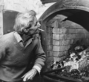 Frederick Law and Sons, maltsters, Wombourne: 'Malting is a seven-day a week job for Will Chambers  - and so is stoking up the furnaces that heat the kilns' - November 1970.