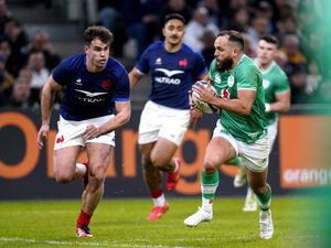 Ireland’s Jamison Gibson-Park, right, in action against France