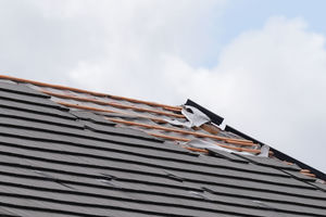 Missing tiles from a roof on St Gile's Road in Knutton. Photo: Jacob King/PA Wire