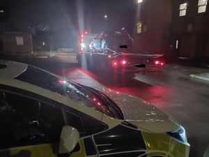 The seized car on a tow truck.