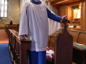 Director of Music at St Mary's Church, Philip Sell, with the organ before its restoration 