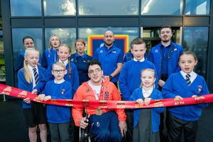 Paralympics GB athlete Harri Jenkins and children from St Joseph's Catholic Primary School cut the ribbon at the opening. Photo: Richard Grange