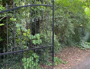 The gated entrance to the drive at Graseley Old Hall.