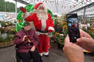 Shelley Pritchard with Santa at Bridgnorth Garden Centre