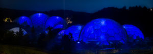 The Eden Project Biomes illuminated blue on Friday evening as part of the NHS birthday celebrations. PA Photo