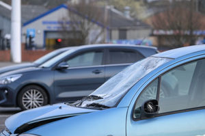 A badly damaged car was dumped in Morrisons car park. Photo: SnapperSK