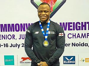 Supporting image for story: Weightlifting gold for Cyrille Cyrille Tchatchet II in India