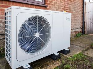 A heat pump outside a house