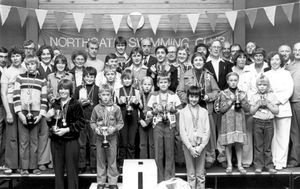 Northgate Swimming Club, Bridgnorth, in October 1979. The picture was shared by the club. was taken in October 1979. The caption reads: 'Cup winners, officials and committee members of Northgate Swimming Club' and the story read: 'A grand gala evening was held at the Bridgnorth Sports and Leisure Centre on Saturday by Northgate Swimming club for their third annual gala. Cups and medals were presented to the swimmers by Colonel Hadoke, who complimented them on their vitality and said that it had been one of the few occasions when he had wished he was younger. Cups for individual swimmers with most points in their age groups were awarded to: eight years and under, Rebecca Davidson and Guy Batty; nine years and under, Leah Ball and Mark Smith; ten years and under, Joanne Connolly and Ian Marshall; 11 years and under, Marion Black and Bobby Gearing; 12 years and under, Sally Kite and Jonathan Wright; 14 years and under, Melani (sic) Kite and Alex Ferrier; ladies' open, Fiona Cadwallader; men's open, Malcolm Dent.