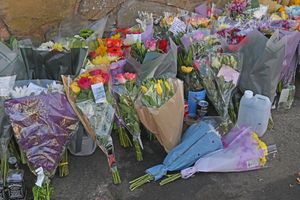 Bottles of whiskey can be spotted among the flowers