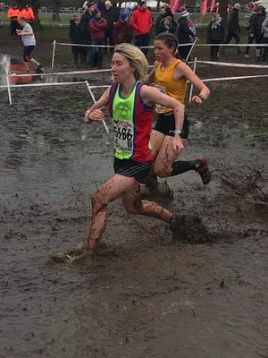 Claire Martin battles through the mud at the National Championships at Wollaton Park course in Nottingham