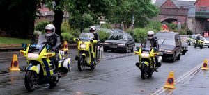 With a police escort, the funeral of PC Dave Hopkins
