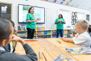 NSPCC volunteers running a workshop for primary school children.