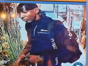 Supporting image for story: Cash stolen from shop till during robbery in Willenhall as police release image