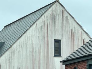 The long red streaks often appear on modern homes, like this one in Lawley