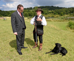 Cyril Brewster offers Mark Andrews a few pointers about how to use a shotgun