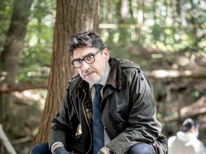 Supporting image for story: Three Pines image offers glimpse of Alfred Molina as police detective