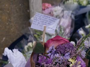 Floral tributes left at the scene of a fire in Gateshead which claimed the life of 14-year-old Layton Carr