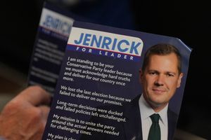 An audience member holds a leaflet at Tory leadership hopeful Robert Jenrick's Conservative Party leadership campaign launch