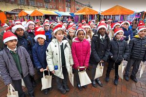 Supporting image for story: School children sing carols at Bilston and Wolverhampton outdoor markets - with pictures