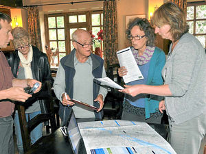 Supporting image for story: Oswestry power line protesters put pens to paper