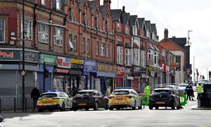 The scene on Bearwood Road, Smethwick after a man was shot 