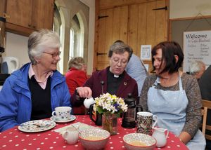 The Venerable Sarah Bullock at St Michael's Church in Llanyblodwel, with Betty Steele and Abbie Tudor
