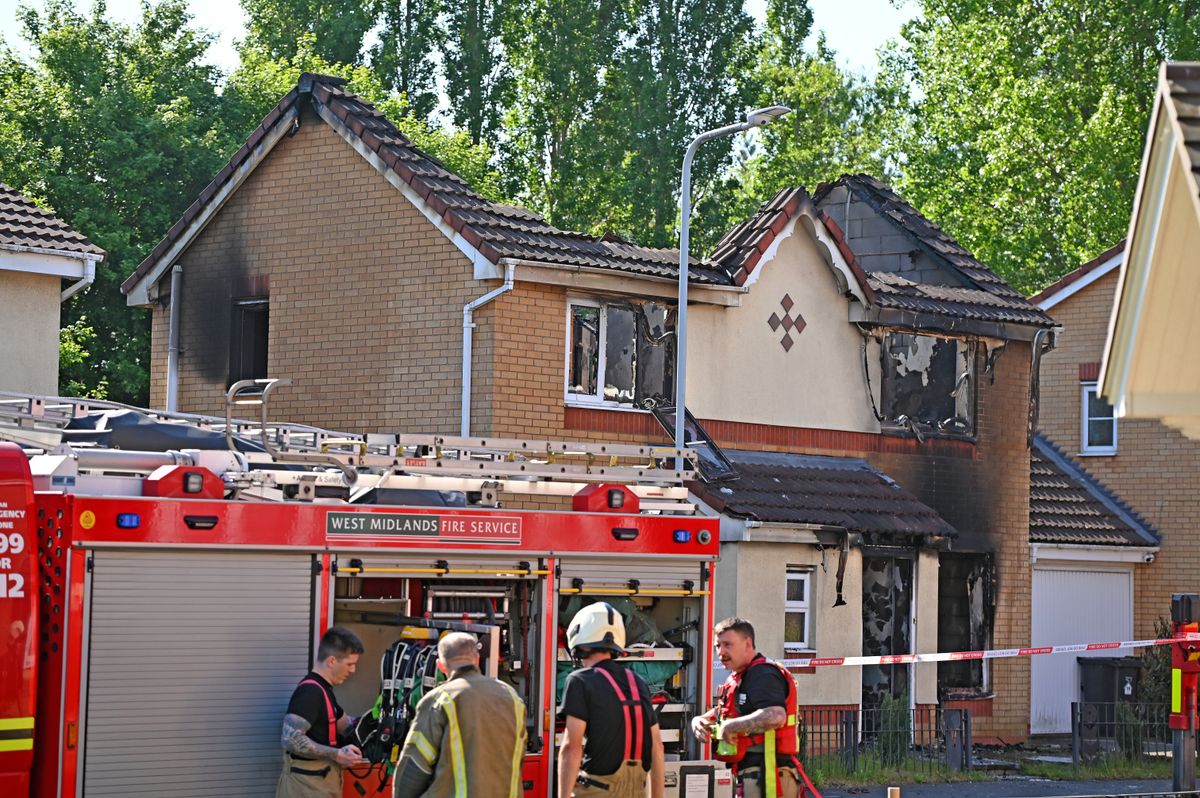 Residents talk of flames shooting through roof and a feeling of shock at devastating fire on Bilston street